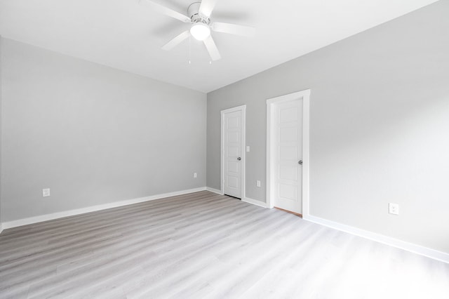 unfurnished bedroom featuring ceiling fan and light hardwood / wood-style flooring