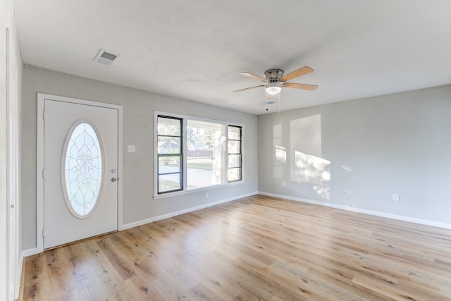 entryway with light hardwood / wood-style floors and ceiling fan