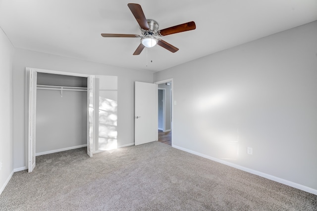 unfurnished bedroom featuring a closet, carpet, and ceiling fan