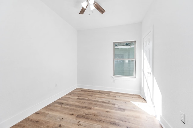 empty room with light hardwood / wood-style floors and ceiling fan