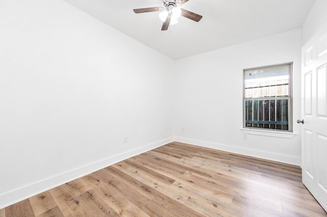 spare room with ceiling fan and light hardwood / wood-style floors