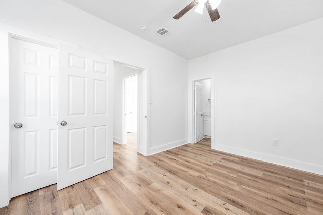 unfurnished bedroom featuring light hardwood / wood-style floors and ceiling fan