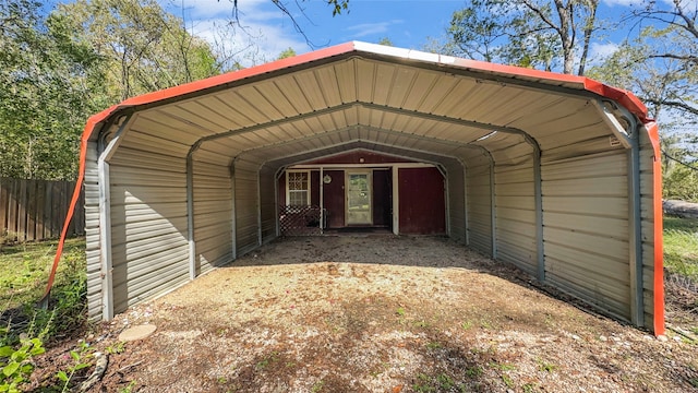 view of outbuilding featuring a carport