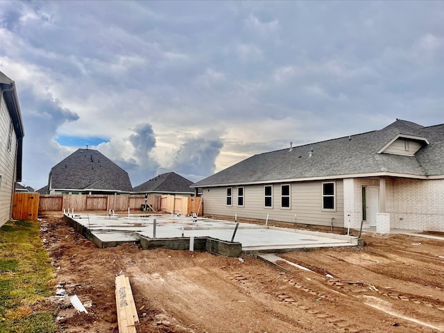 back of house with a patio