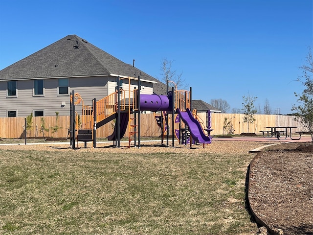 view of playground with a yard