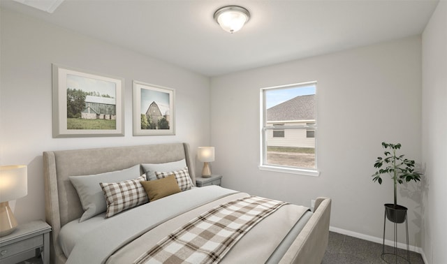 bedroom featuring dark colored carpet