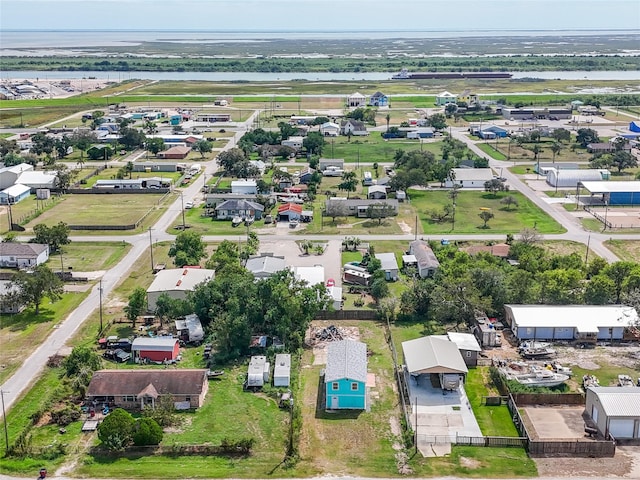 381 Center St, Matagorda, TX 77457 - aerial perspective of suburban area featuring a large body of water