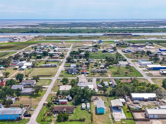 381 Center St, Matagorda, TX 77457 - aerial view of property and surrounding area with a large body of water and nearby suburban area