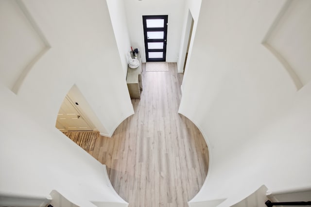 stairs with wood-type flooring