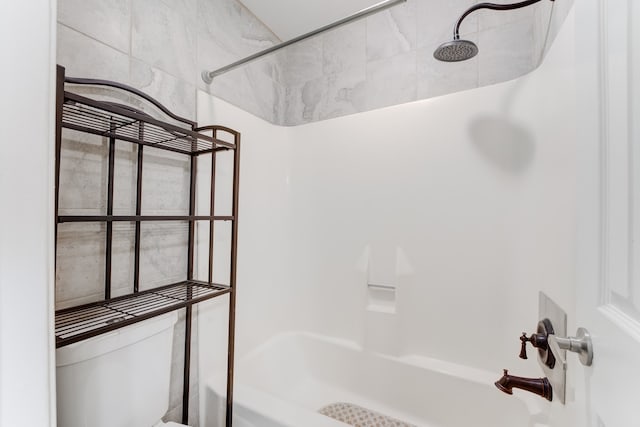 bathroom featuring tiled shower / bath combo