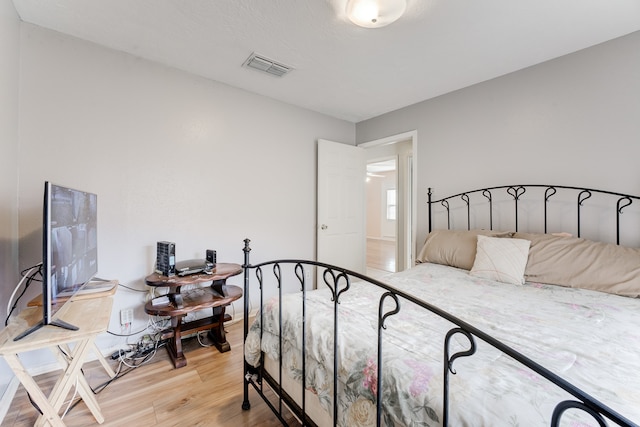 bedroom featuring light hardwood / wood-style flooring