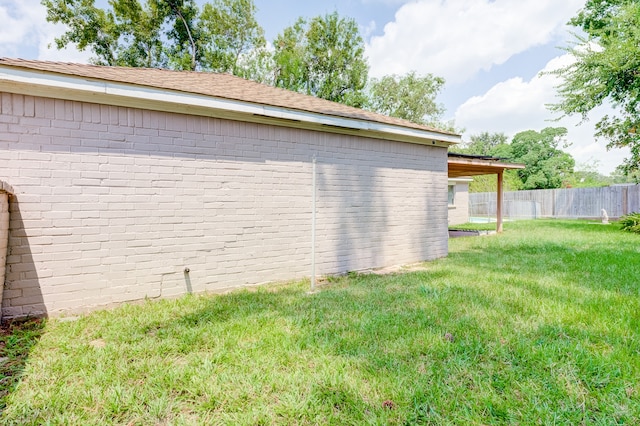 garage with a yard