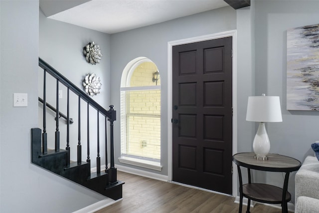 foyer entrance with wood-type flooring