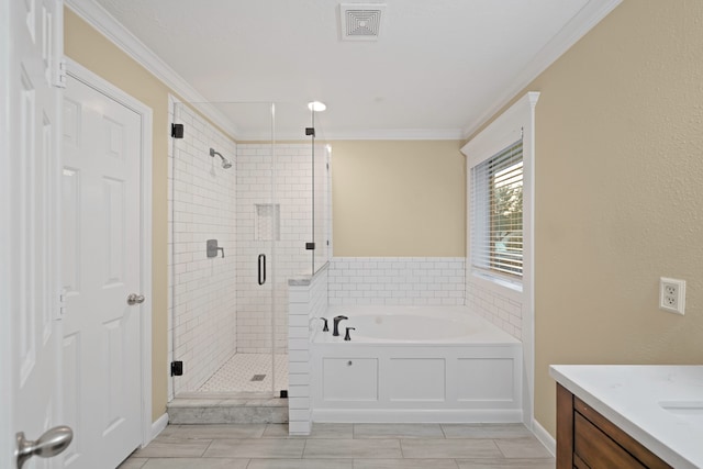 bathroom featuring vanity, crown molding, and plus walk in shower