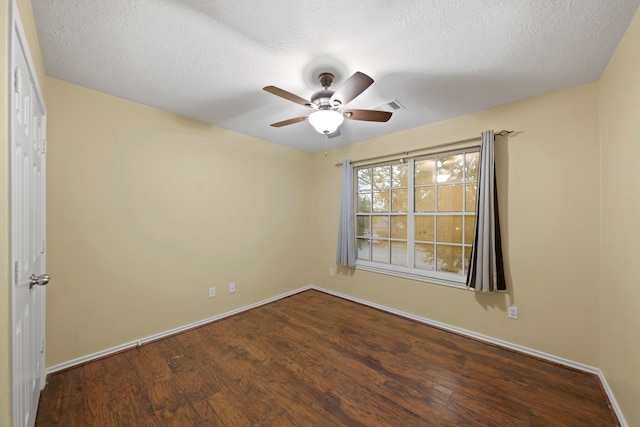 unfurnished room featuring a textured ceiling, hardwood / wood-style flooring, and ceiling fan