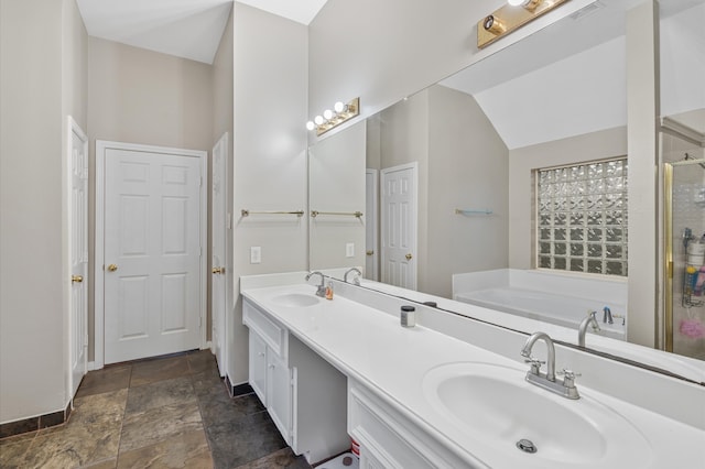 bathroom featuring shower with separate bathtub, vanity, and lofted ceiling