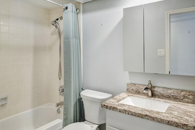 full bathroom with shower / bathtub combination with curtain, vanity, and toilet