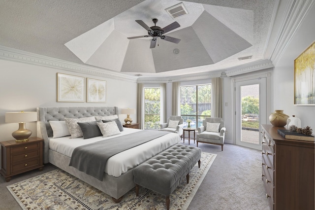 carpeted bedroom featuring ceiling fan, a raised ceiling, crown molding, a textured ceiling, and access to outside