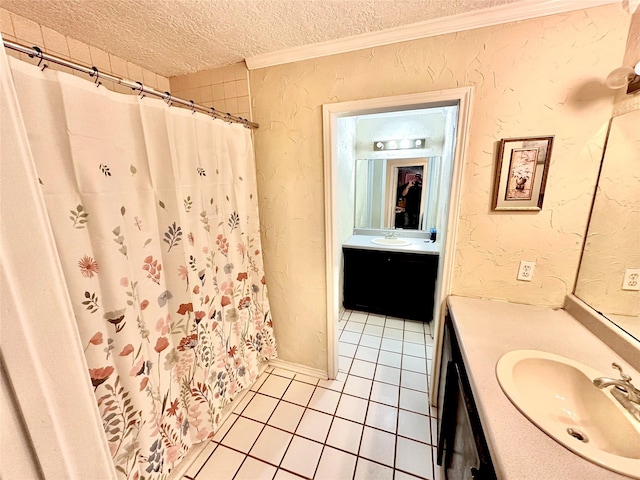 bathroom featuring a shower with shower curtain, vanity, a textured ceiling, crown molding, and tile patterned flooring