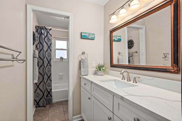 bathroom featuring vanity, shower / bathtub combination with curtain, and tile patterned flooring