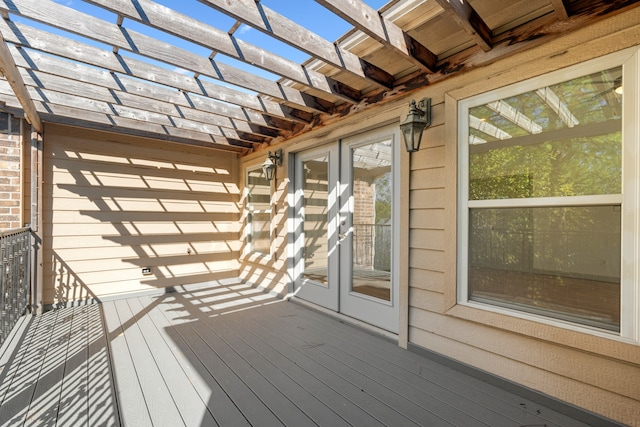 wooden terrace with a pergola