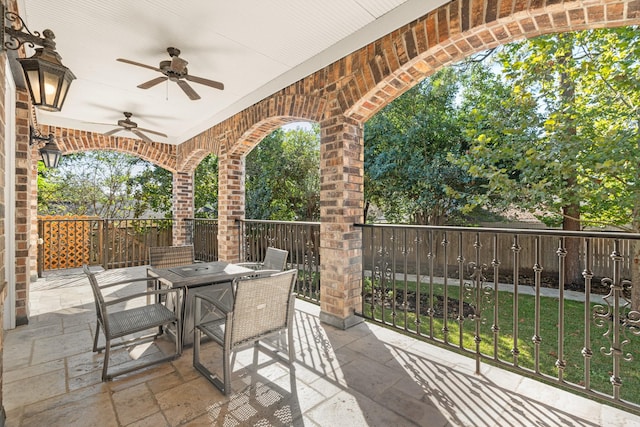 view of patio / terrace with outdoor dining space and ceiling fan