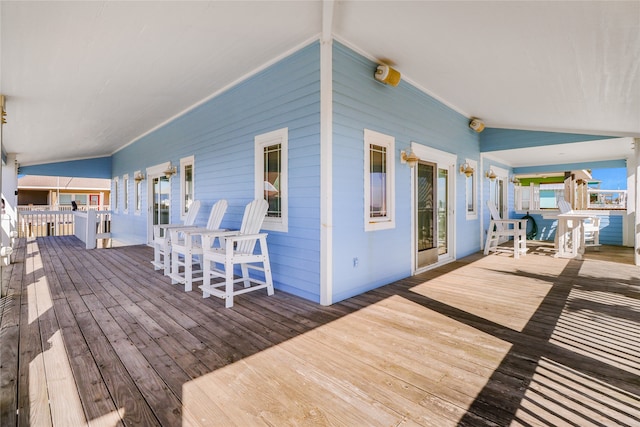 wooden terrace with a porch