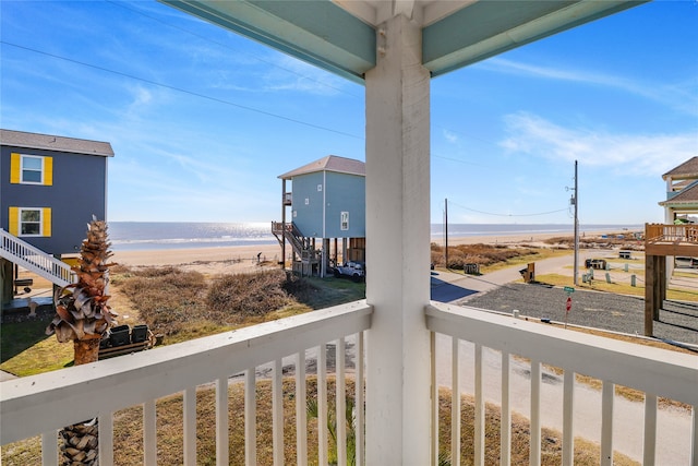 balcony featuring a water view