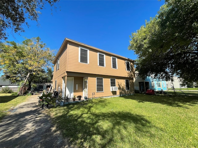 view of front of property with a front lawn