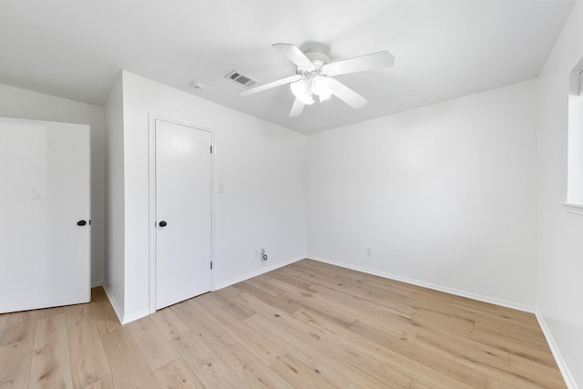 unfurnished bedroom featuring a closet, ceiling fan, and light hardwood / wood-style flooring