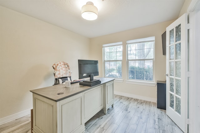 office area with light wood-type flooring