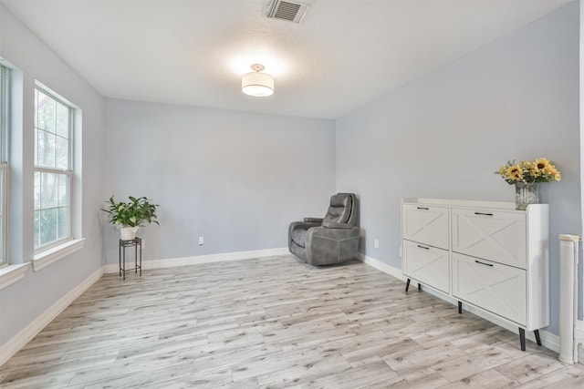 living area featuring light hardwood / wood-style flooring