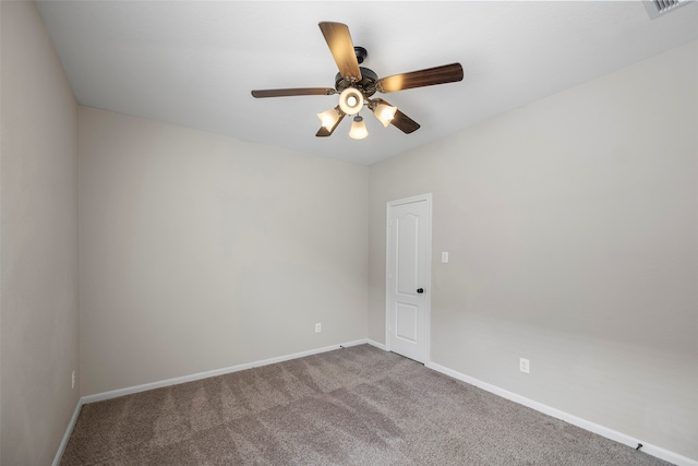 carpeted empty room with ceiling fan