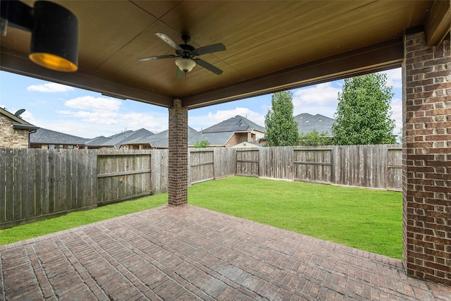 view of patio / terrace featuring ceiling fan