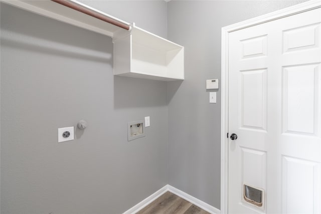 laundry room with hardwood / wood-style floors, electric dryer hookup, and hookup for a washing machine