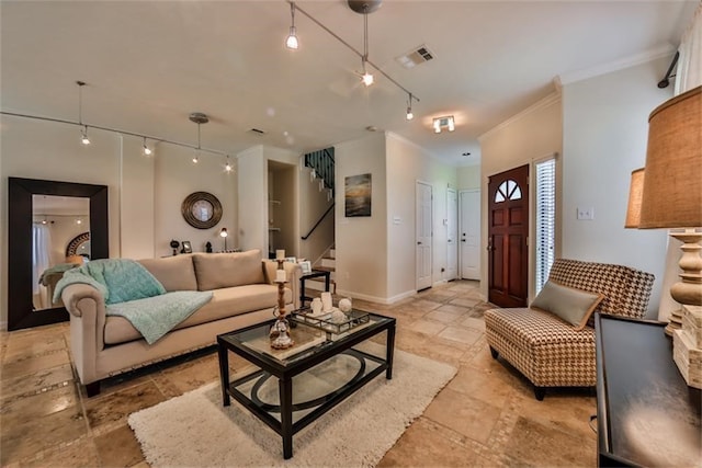 living room with ornamental molding