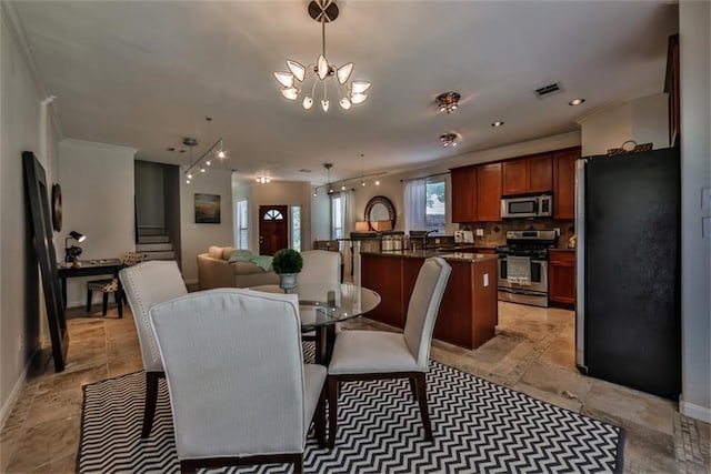 dining area with a chandelier