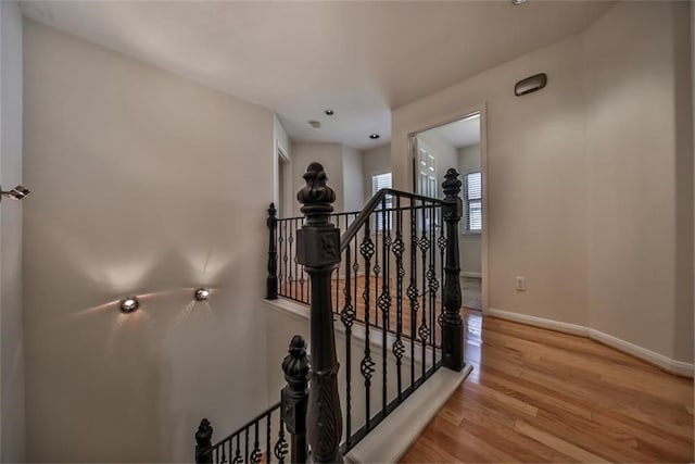 hallway with light wood-type flooring