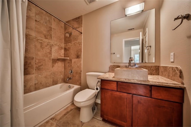 full bathroom with toilet, vanity, and shower / bath combination with curtain