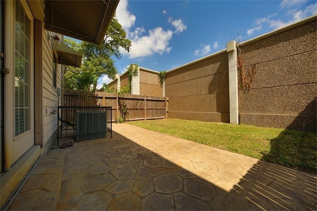 view of patio featuring cooling unit