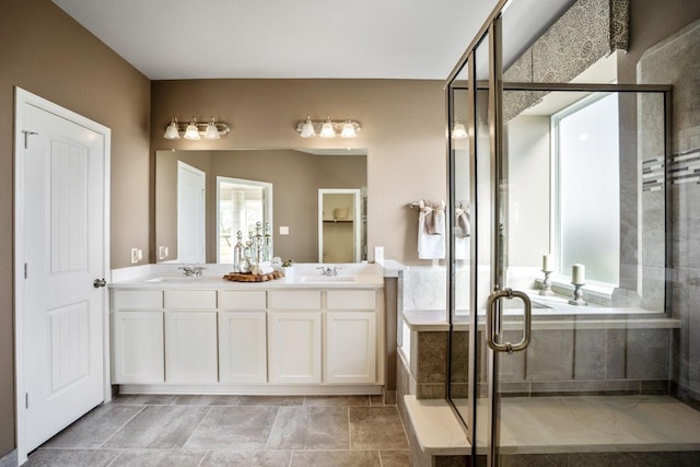 bathroom featuring vanity and an enclosed shower