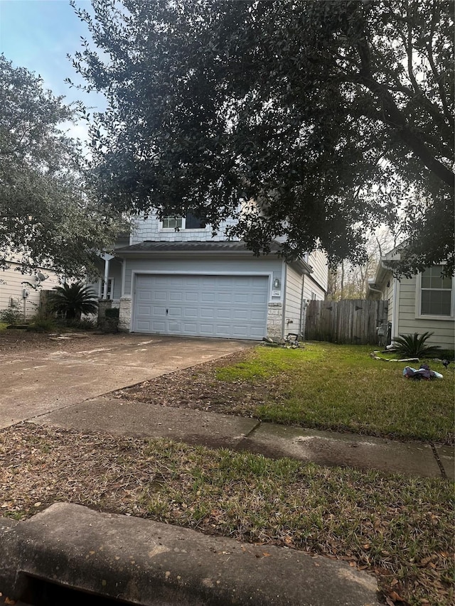 garage featuring a lawn