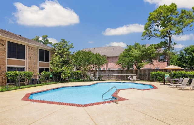 view of pool with a patio area