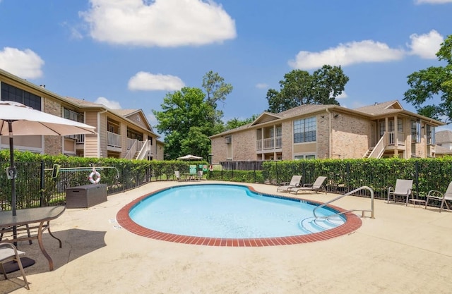 view of pool with a patio