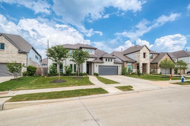 view of front of home with a garage and a front lawn