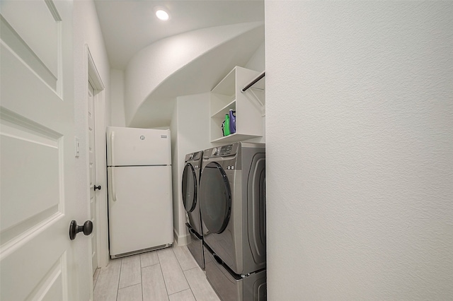 laundry room with washer and clothes dryer