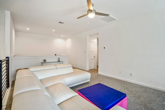 living room with ceiling fan and carpet flooring