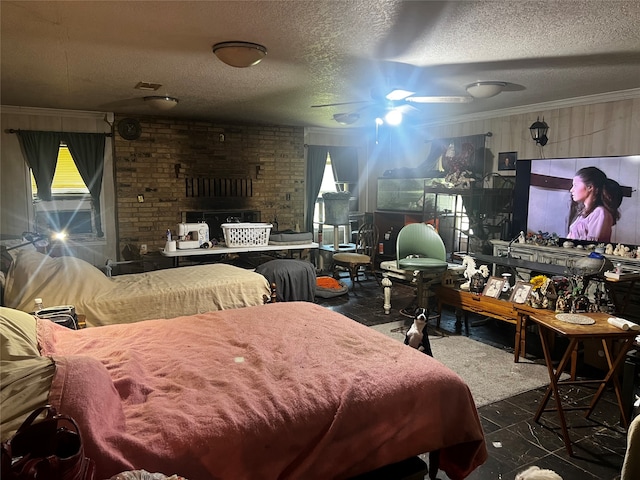 bedroom featuring ornamental molding, a textured ceiling, and ceiling fan