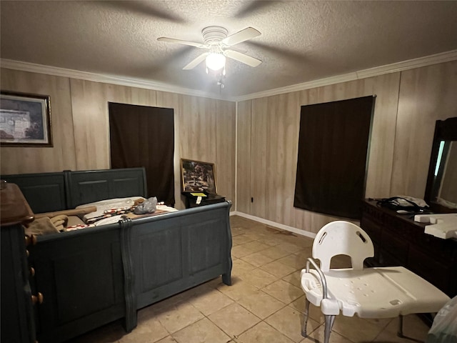 bedroom featuring a textured ceiling, ceiling fan, crown molding, and light tile patterned floors