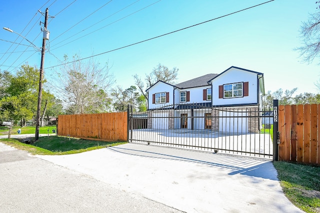 view of gate featuring a garage